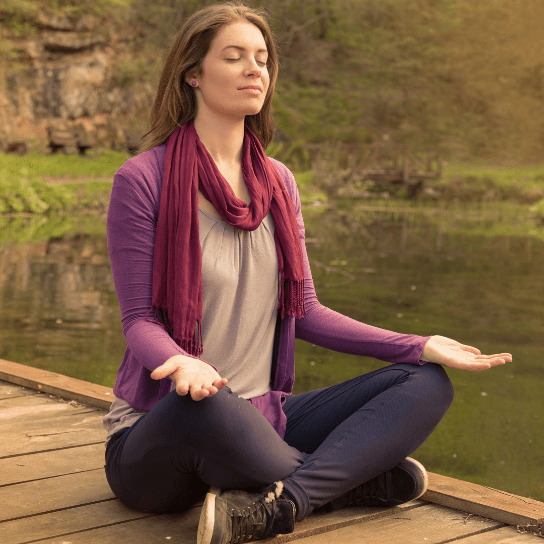 Peaceful meditation setting with candles and spiritual elements